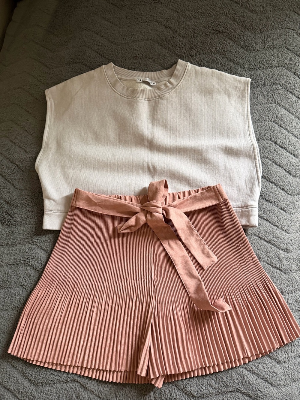 Zara cream sleeveless top with pink pleated skort
